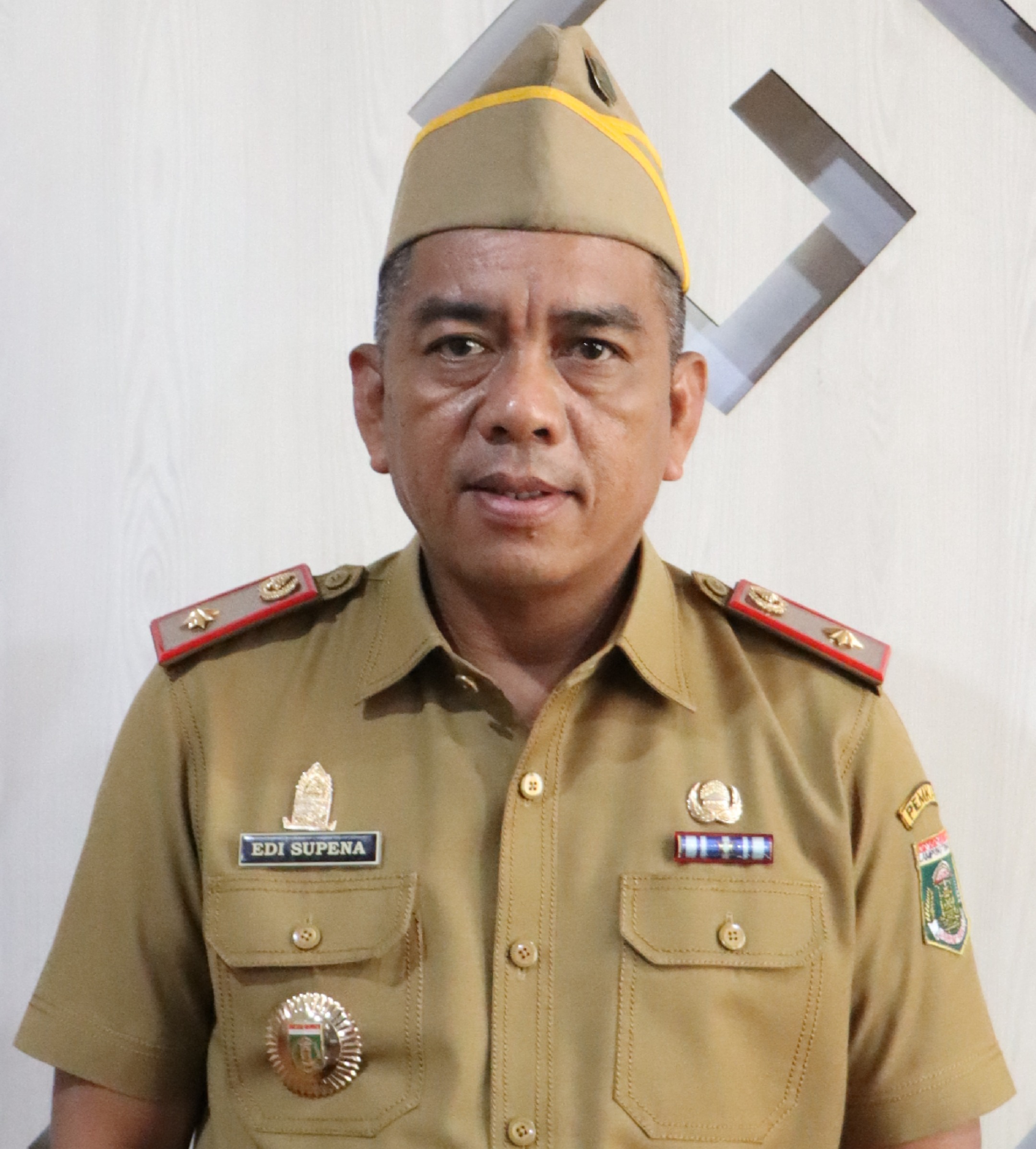  EDI SUPENA, S.Sos., M.M. 